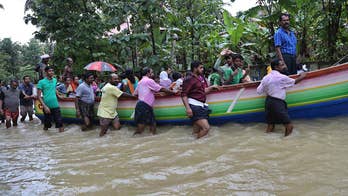 Rescue efforts continue as solders and rescue crews try to help people stranded by heavy flooding following days of incessant rain in southern India's Kerala state.