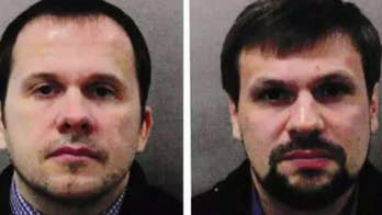 British authorities charge two Russian men with attempted murder over the poisoning of an ex-spy and his daughter.