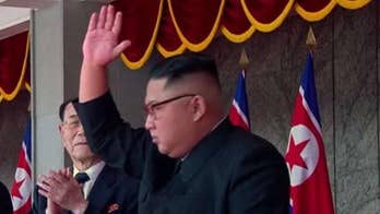 North Korea leaves missiles out of military parade. Greg Palkot reports.