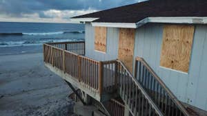 Drone footage shows North Topsail Beach, North Carolina after residents board up and evacuate their homes before Hurricane Florence is expected to arrive.