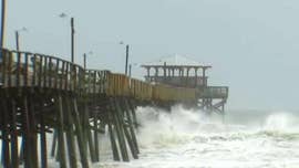 The first powerful winds and rains from a weakened but still dangerous Hurricane Florence began lashing the North Carolina coast Thursday morning, as the monster Category 2 barreled in for a prolonged and potentially catastrophic stay along the Mid-Atlantic region.
