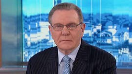 Russia's military on Tuesday said one of its aircraft with 15 people on board was shot down by Syrian government missiles and blamed the Israeli Air Force for pushing its Il-20 jet into the line of fire of Syrian missiles.