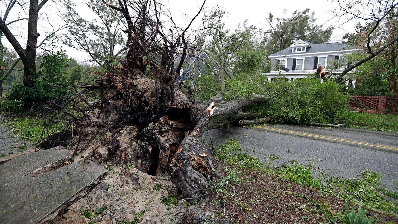 Florence downgraded to tropical storm after first deaths reported in North Carolina