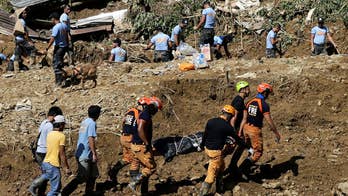 At least 65 are dead in the Philippines after a powerful storm triggered dozens of landslides; Benjamin Hall reports on the rescue efforts.