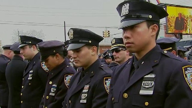 Officers turn their backs as de Blasio delivers Liu eulogy