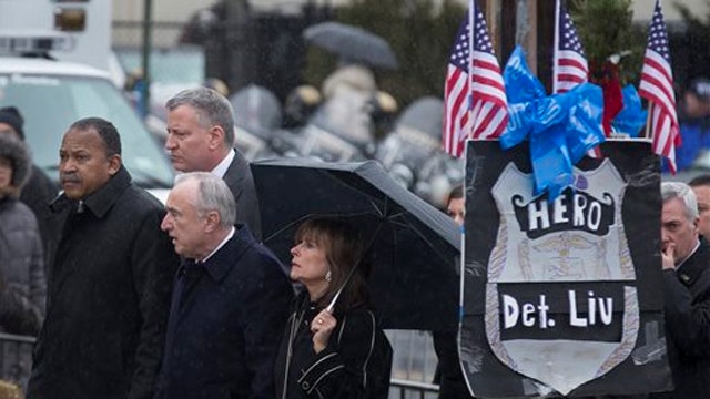 Family, dignitaries gather for the wake of NYPD Officer Liu