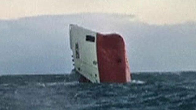 Eight feared dead after ship capsizes off Scotland