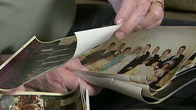 Volunteer group restores photos for Sandy victims