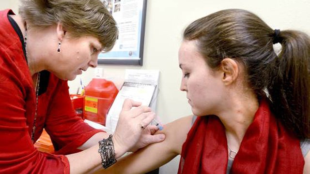 Flu outbreak sweeps US weeks before peak of season