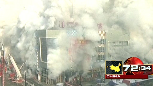 Around the World: Flames engulf shopping center in China