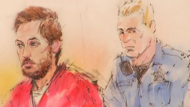 Tearful testimony in theater shooting suspect's hearing