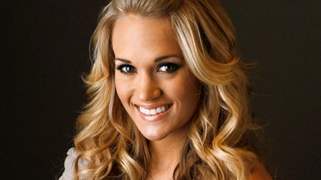Carrie Underwood sets bar high for 2013