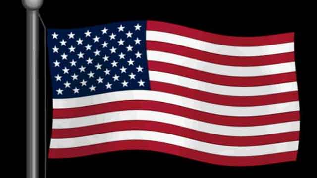 English teacher stomps on American flag