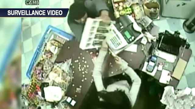 Store owner uses hidden gun to foil robbery