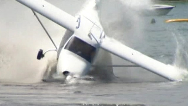 Plane flips in sea on takeoff after emergency beach landing