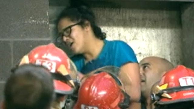 Inside rescue operation for woman stuck between walls