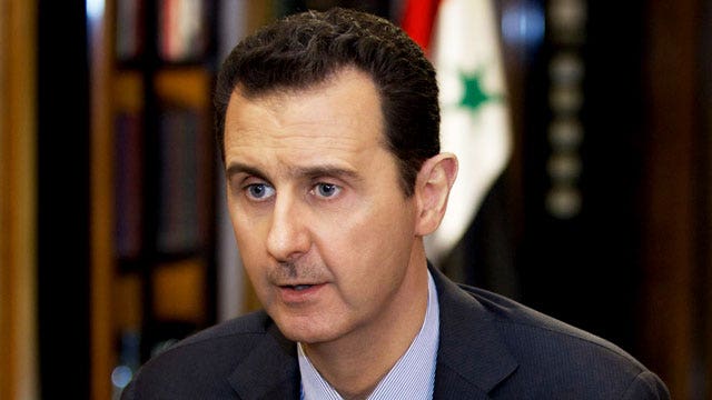 Assad must go: Syrian peace talks get off to tense start