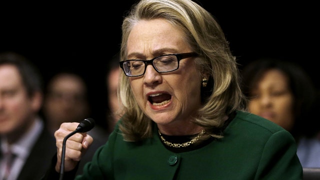 Clinton clashes with Republicans over Benghazi