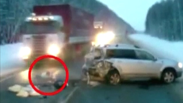 Baby nearly run over on Russian highway