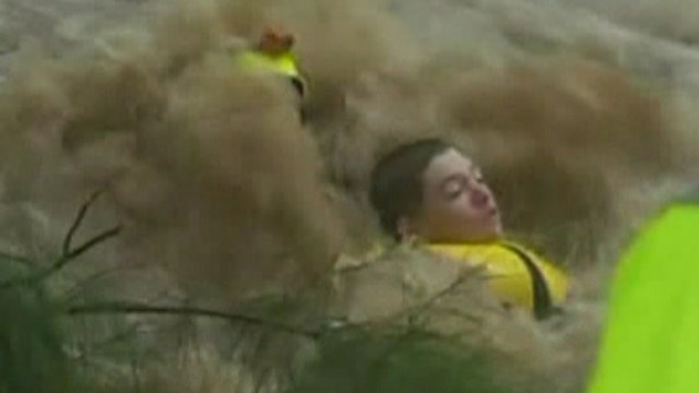 Teen saved in daring water rescue