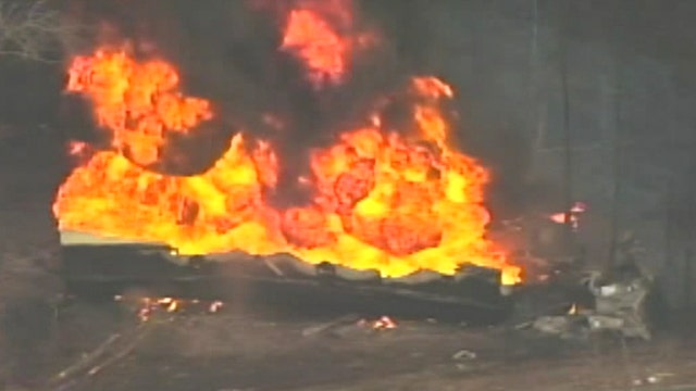 Gasoline tanker rolls over, explodes in Massachusetts