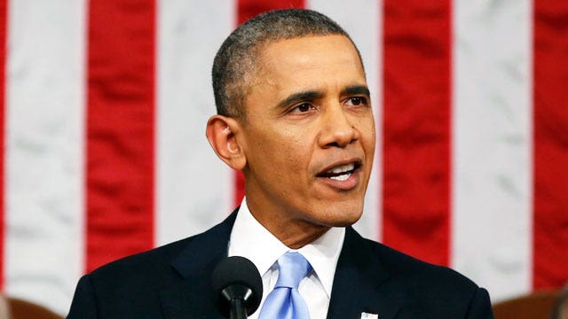 Obama warns divided Congress that he will act alone