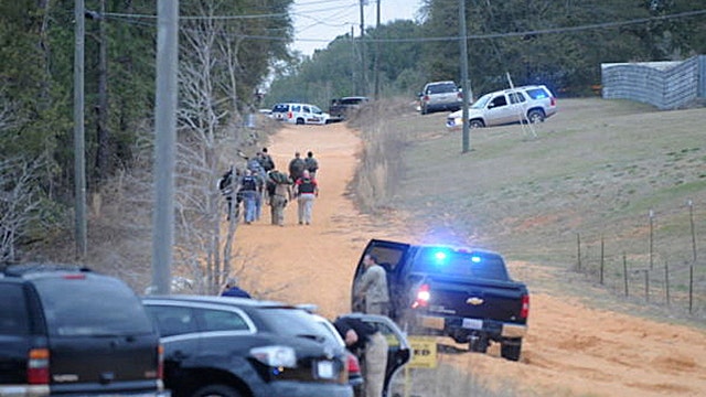 Police standoff after fatal school bus shooting, kidnapping