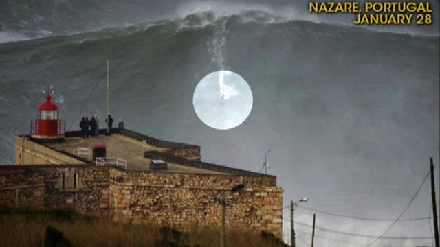 Surfer catches record wave estimated at 100 feet