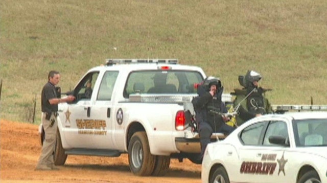 Negotiators try to reason with Alabama standoff suspect