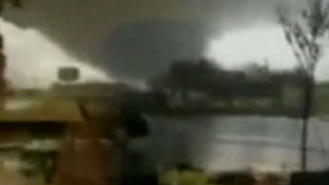 Tornadoes, floods kill 2, destroy homes