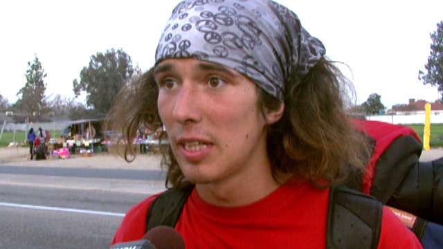 Hero hitchhiker uses hatchet to save woman from 'Jesus'