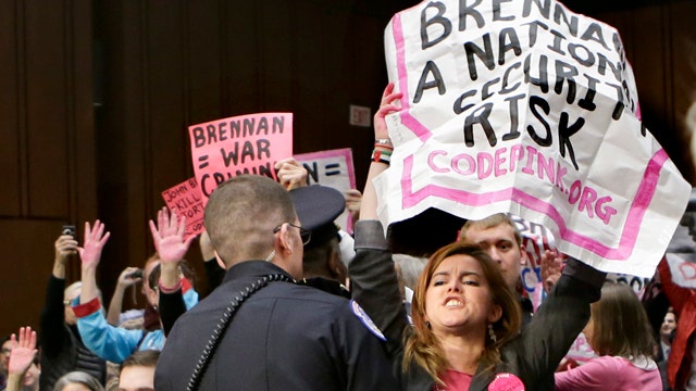 Protesters halt Brennan confirmation hearing