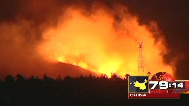 Around the World: Thousands battle massive flames in China