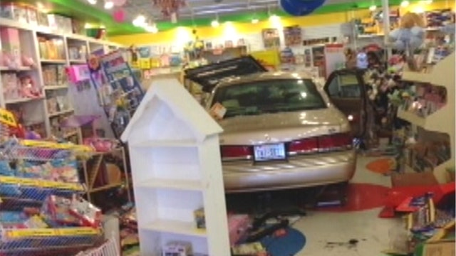 Disaster narrowly avoided when car plows through toy store