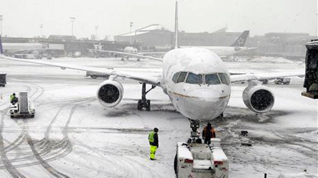 Storm-battered travelers get a break from airlines