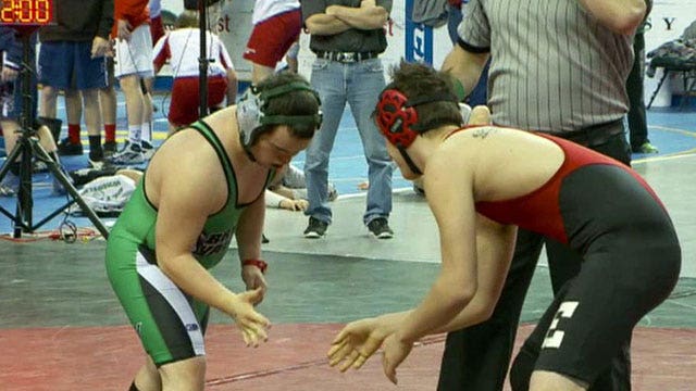 High school wrestler helps change hearts, minds