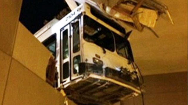 Dashcam running as bus plows into building