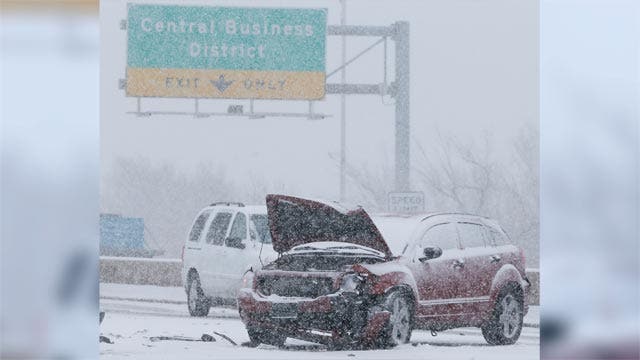 Powerful winter storm slams Central Plains, Southwest