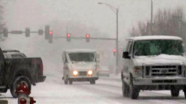 Massive winter storm churns across Midwest