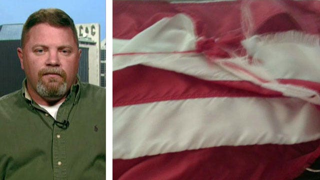 Navy veteran fired for replacing tattered American flag?