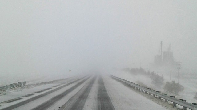 White-out conditions as 2nd blizzard hits Plains states