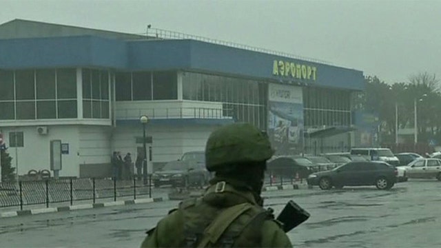 Russian marines surround airport in Ukraine