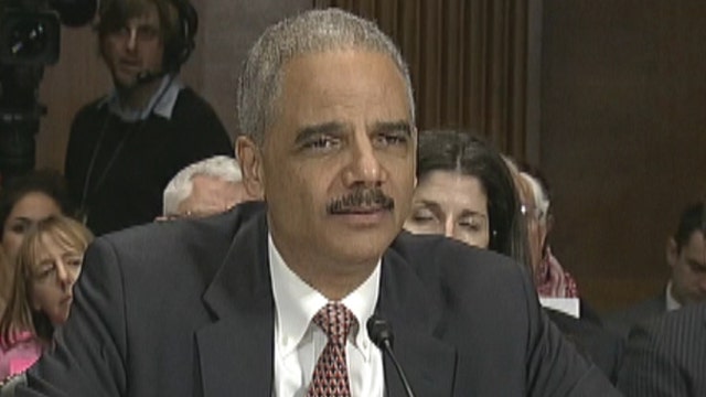 Eric Holder questioned on Aaron Swartz prosecution