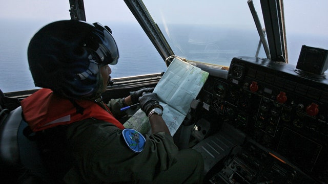 Search widens for missing Malaysia Airlines flight