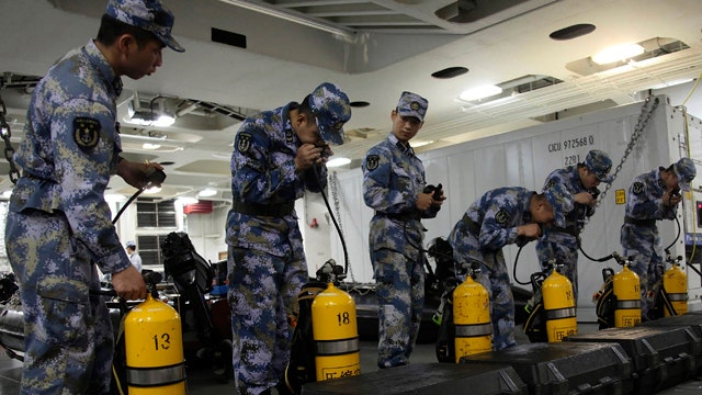 Why is search for missing Malaysia jet taking days?