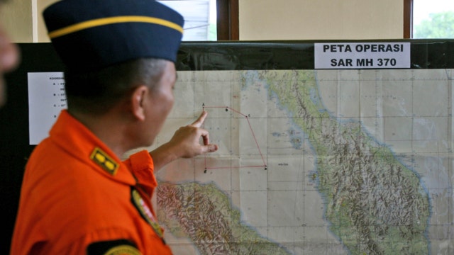 Investigators expand search area for missing Malaysia plane