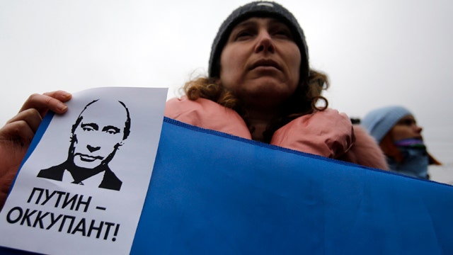 What will Putin do after Crimea referendum vote?