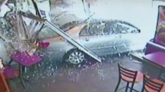 Out-of-control car crashes into Dunkin' Donuts 