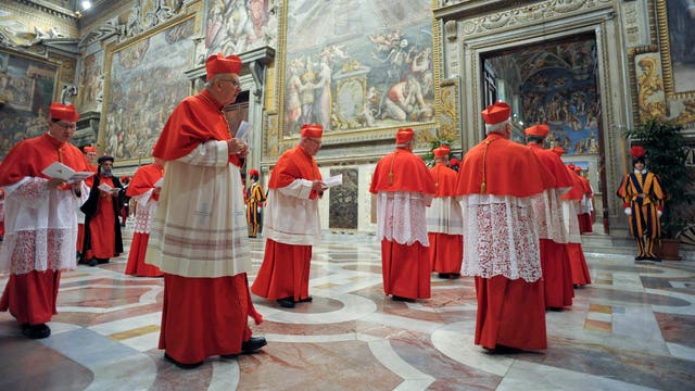 What does conclave mean to Catholics?