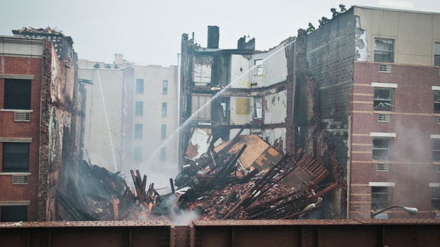 Massive fire still smoldering in New York